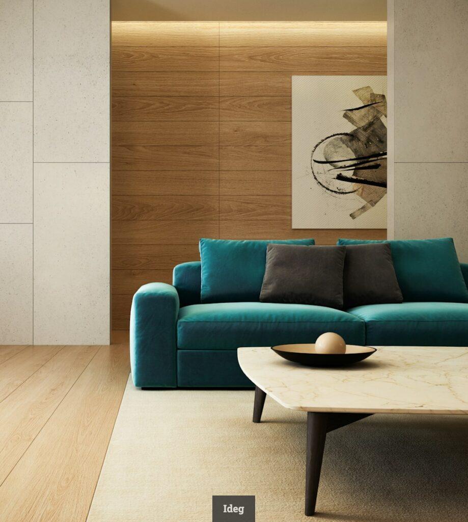 blue sofa beside brown wooden table